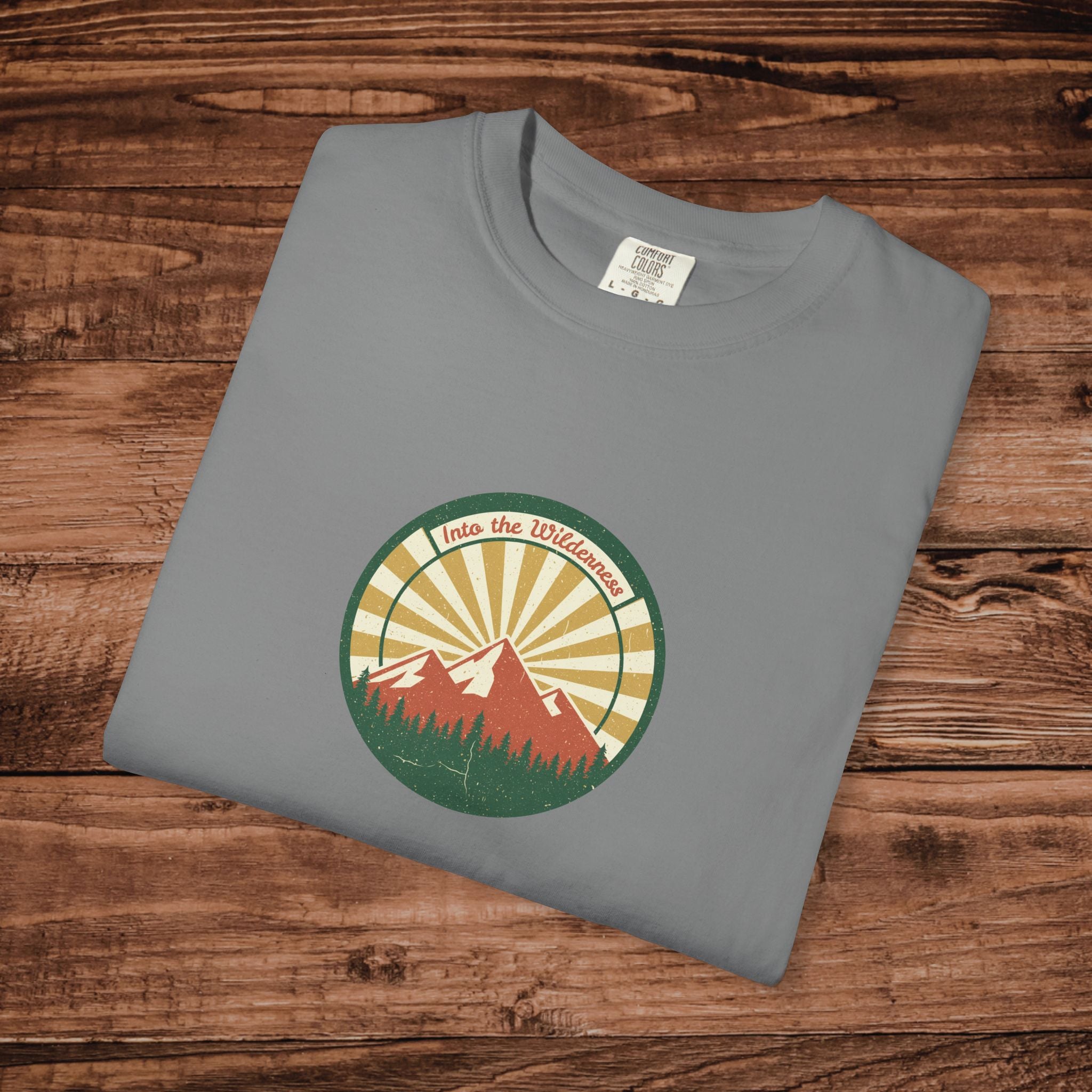 Into the Wilderness Sunrise Mountain Badge T-Shirt | Retro Outdoor Nature Graphic
