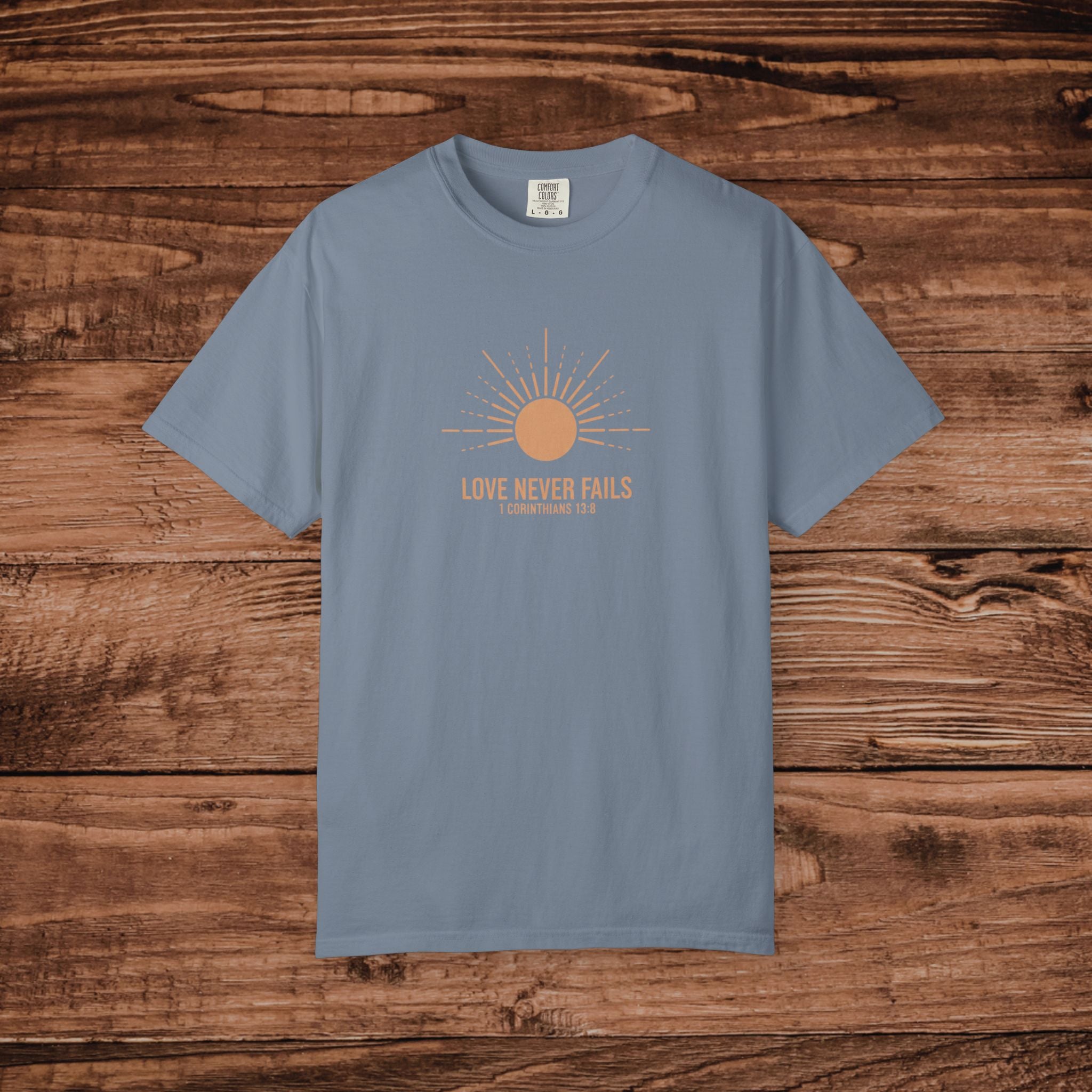 Love Never Fails sun graphic T-Shirt | faith scripture typography