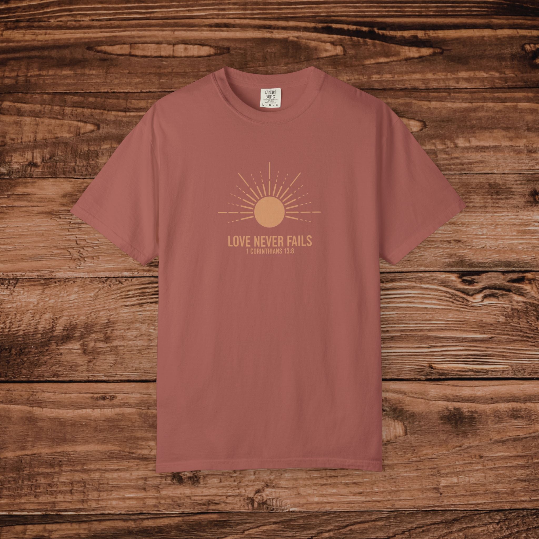 Love Never Fails sun graphic T-Shirt | faith scripture typography