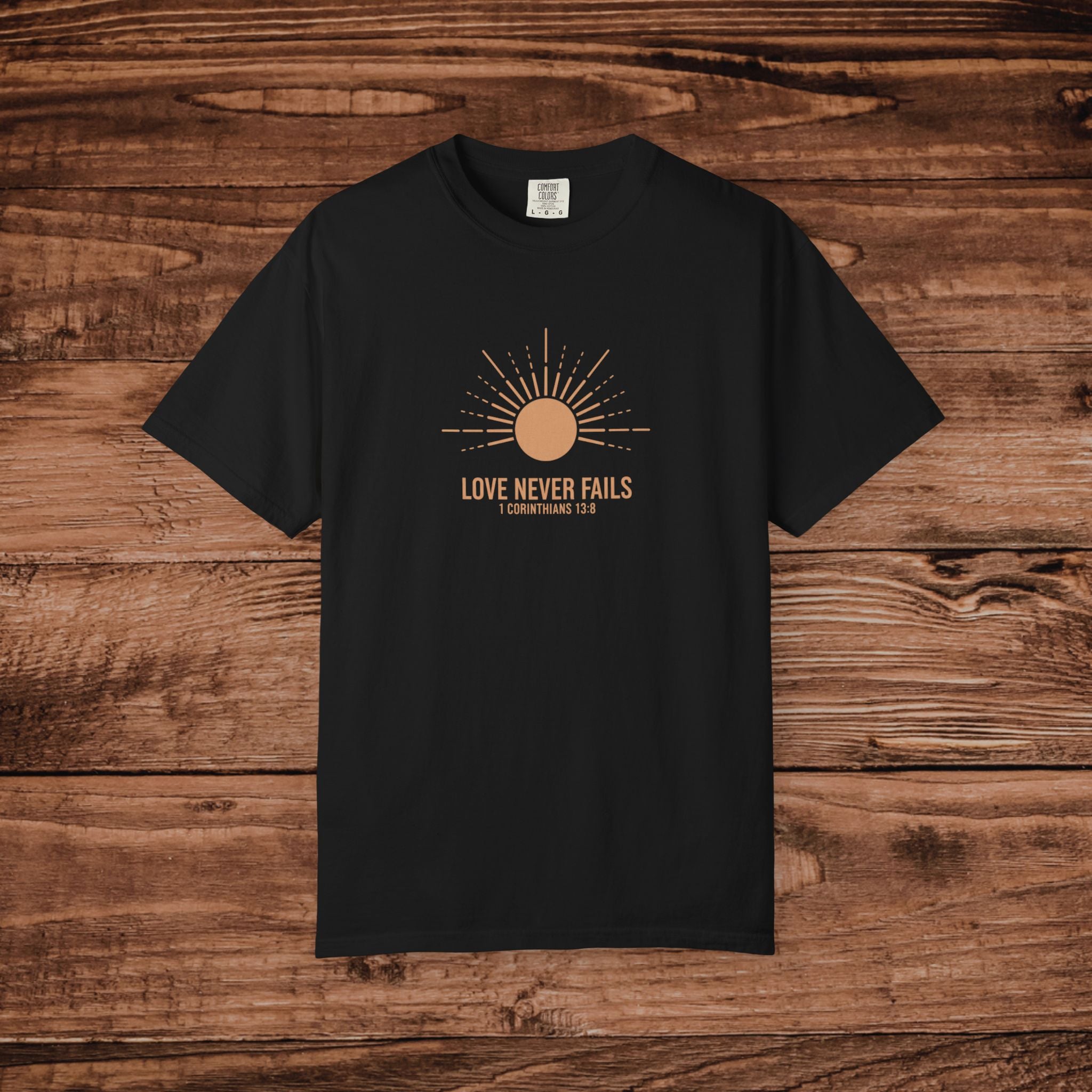 Love Never Fails sun graphic T-Shirt | faith scripture typography
