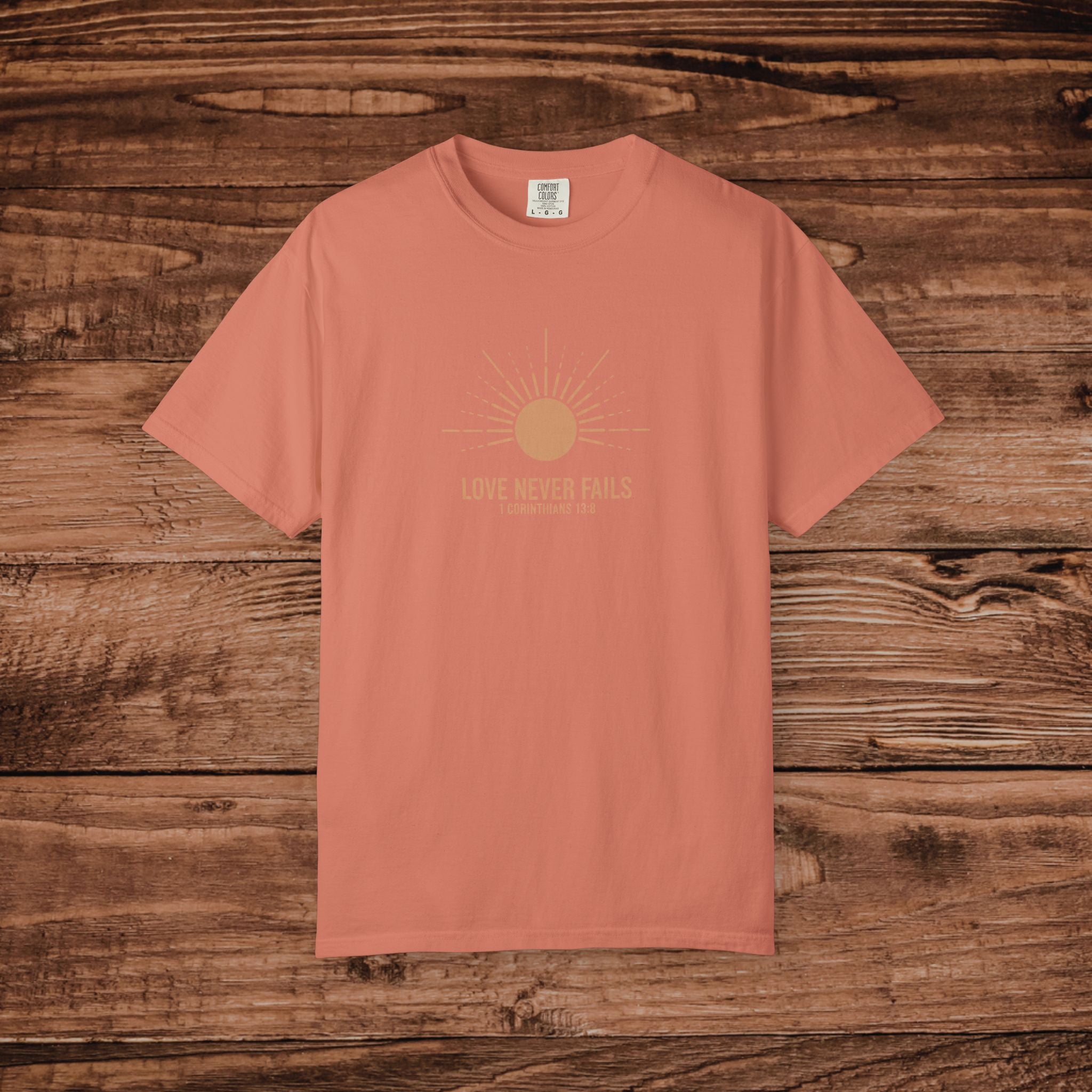 Love Never Fails sun graphic T-Shirt | faith scripture typography