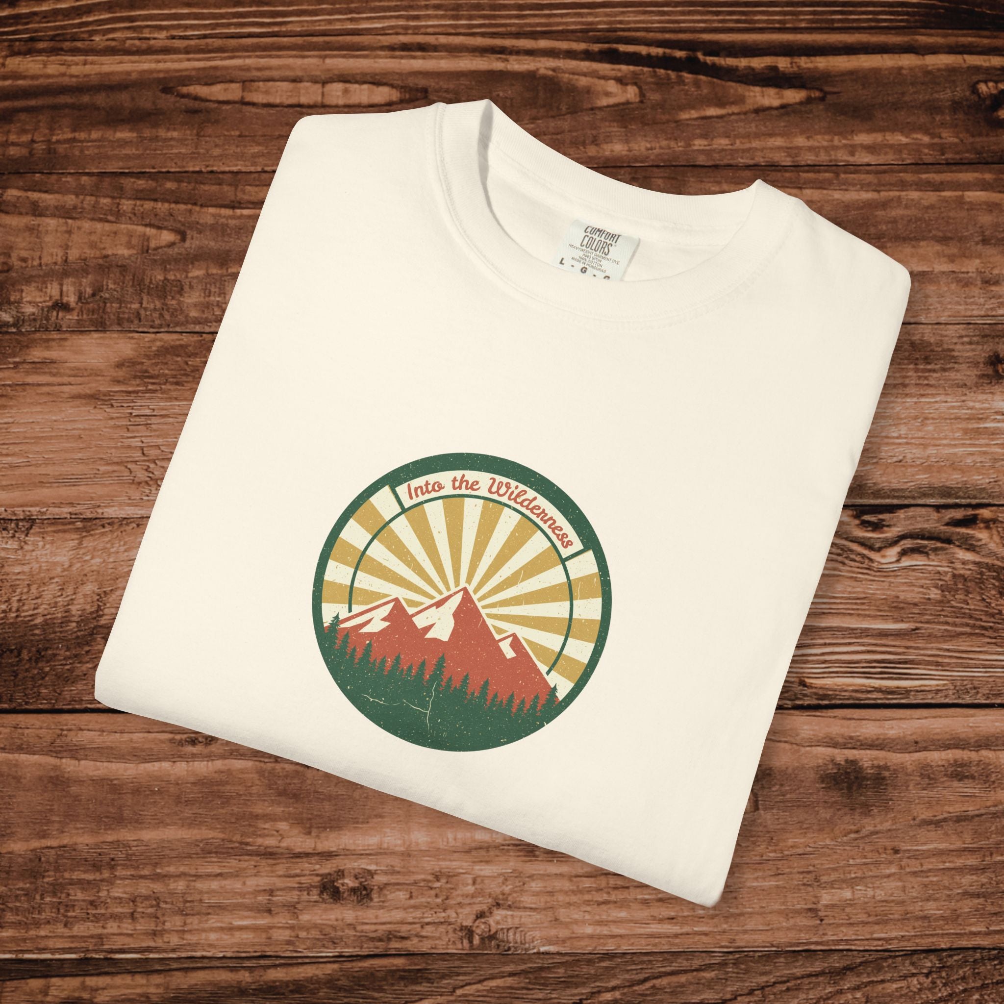 Into the Wilderness Sunrise Mountain Badge T-Shirt | Retro Outdoor Nature Graphic