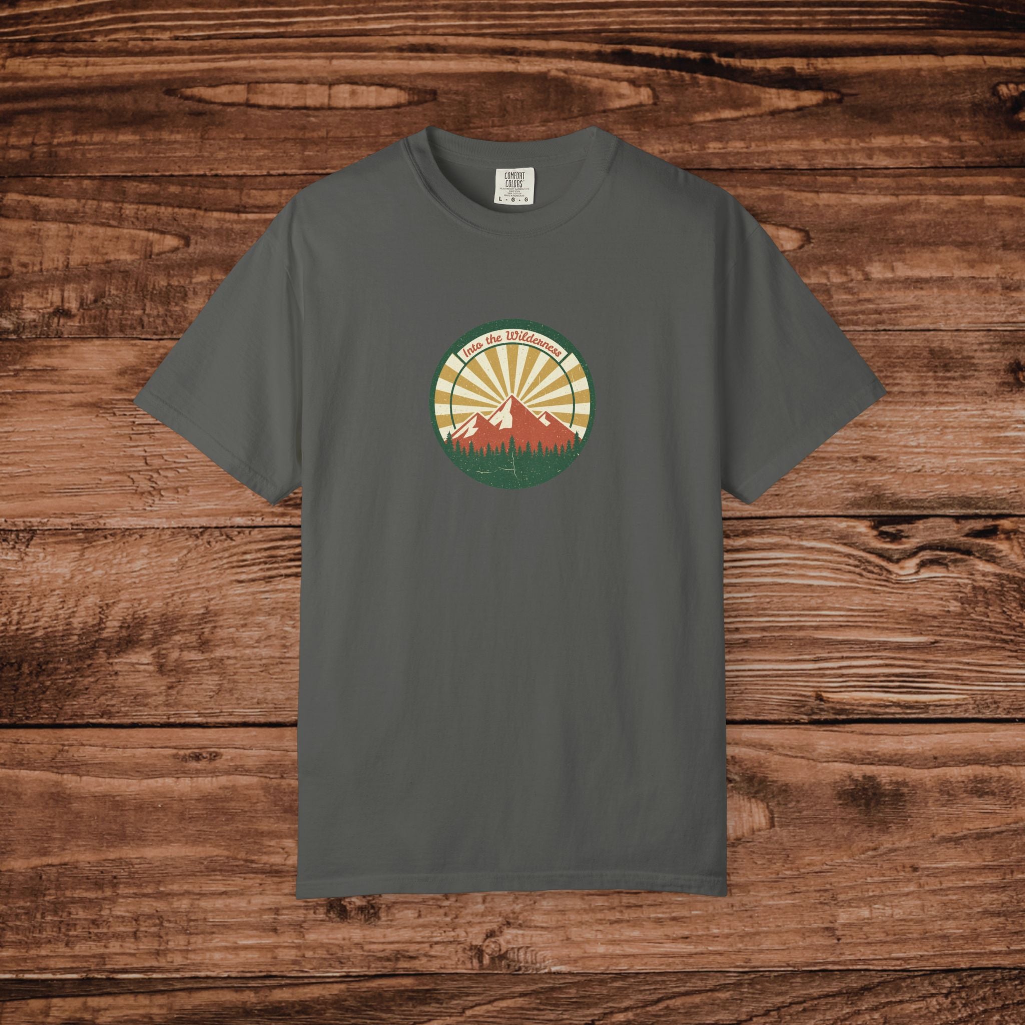 Into the Wilderness Sunrise Mountain Badge T-Shirt | Retro Outdoor Nature Graphic
