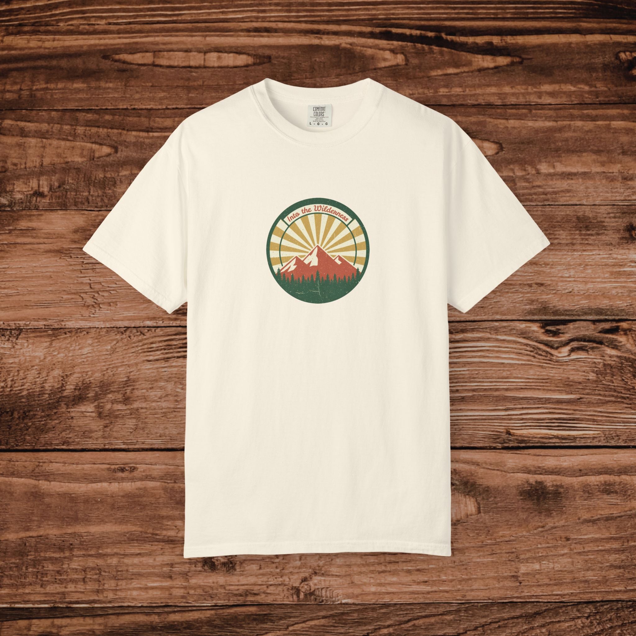 Into the Wilderness Sunrise Mountain Badge T-Shirt | Retro Outdoor Nature Graphic