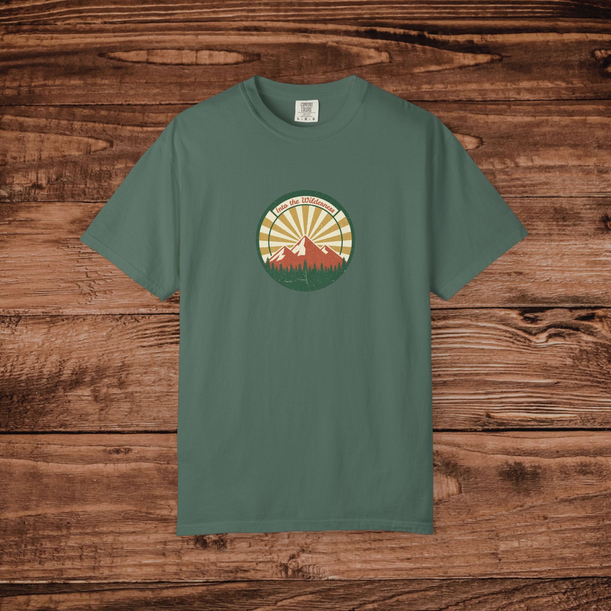Into the Wilderness Sunrise Mountain Badge T-Shirt | Retro Outdoor Nature Graphic
