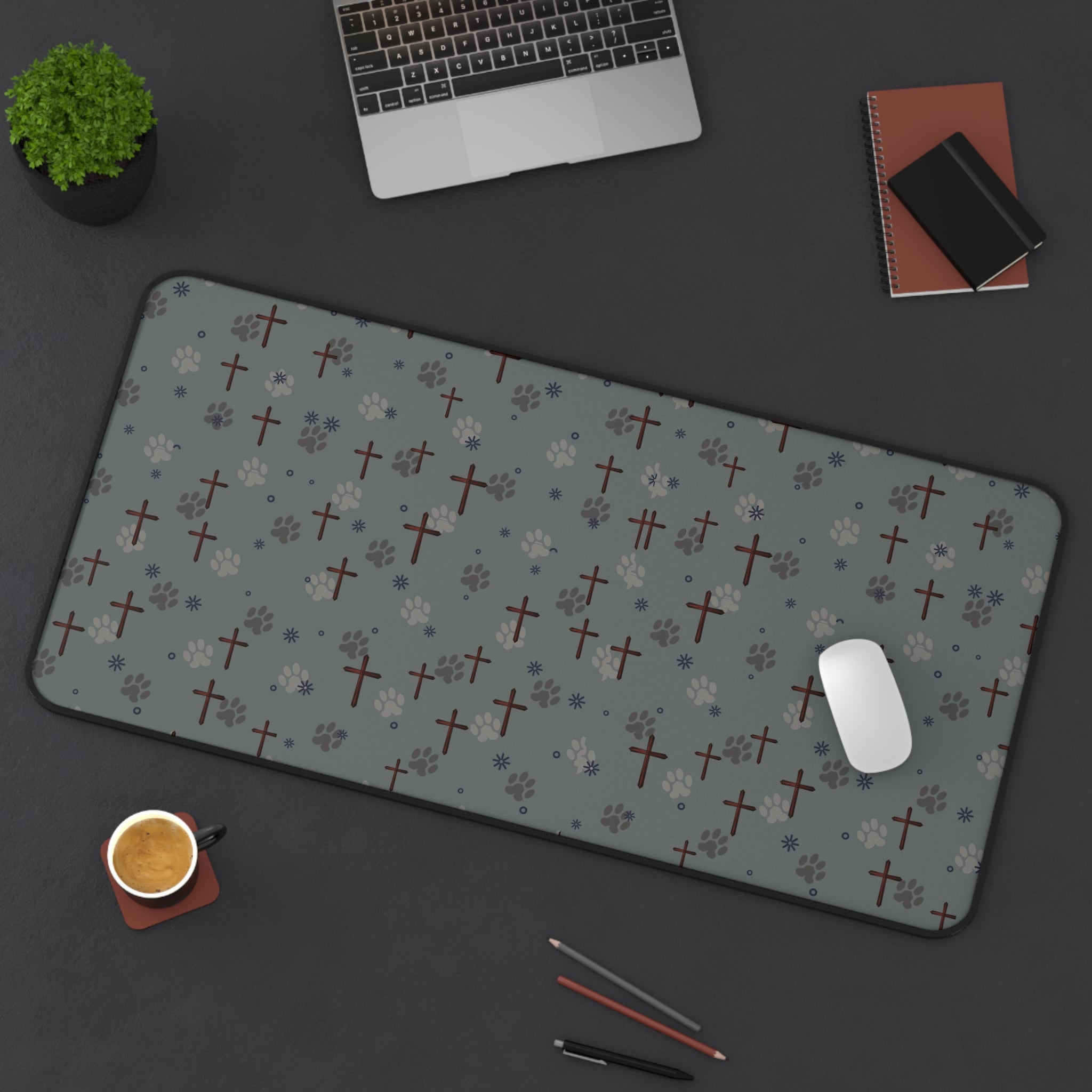 desk mat for the faithful pet lover with the dog paw and cross pattern across entire area