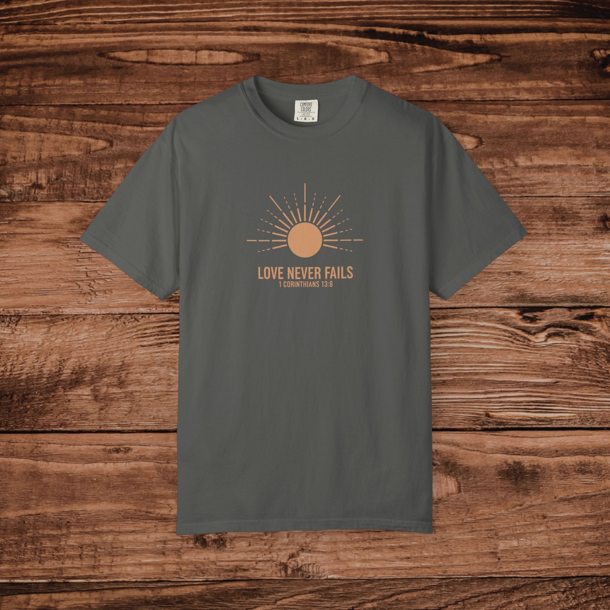 Love Never Fails sun graphic T-Shirt | faith scripture typography